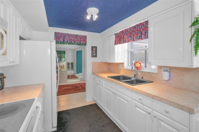 POOL HOME with a PRICE IMPROVEMENT! Bring OFFERS! This rare find on Forest Hills Golf Course in Florida - for sale on GolfHomes.com, golf home, golf lot