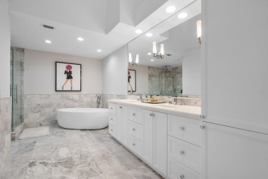 Experience modern elegance in this 4-bedroom, 3-bath condo with on Broken Sound Golf and Club  in Florida - for sale on GolfHomes.com, golf home, golf lot