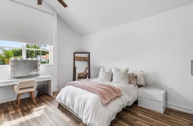 Experience modern elegance in this 4-bedroom, 3-bath condo with on Broken Sound Golf and Club  in Florida - for sale on GolfHomes.com, golf home, golf lot