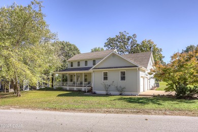 Welcome to this 4-bedroom, 2 1/2-bath Briarbrook beauty. The on Briarbrook Golf Course in Missouri - for sale on GolfHomes.com, golf home, golf lot