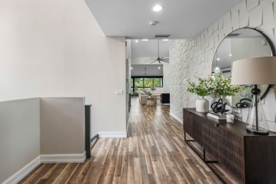 Experience modern elegance in this 4-bedroom, 3-bath condo with on Broken Sound Golf and Club  in Florida - for sale on GolfHomes.com, golf home, golf lot