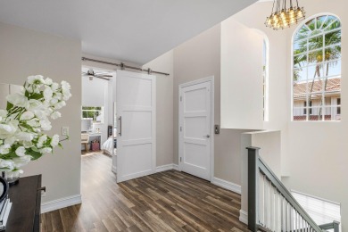 Experience modern elegance in this 4-bedroom, 3-bath condo with on Broken Sound Golf and Club  in Florida - for sale on GolfHomes.com, golf home, golf lot