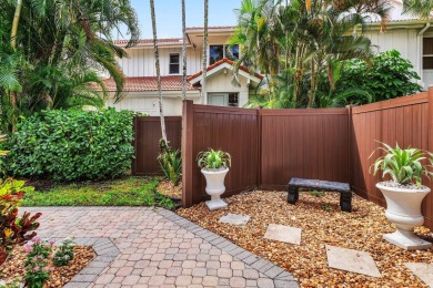 Experience modern elegance in this 4-bedroom, 3-bath condo with on Broken Sound Golf and Club  in Florida - for sale on GolfHomes.com, golf home, golf lot