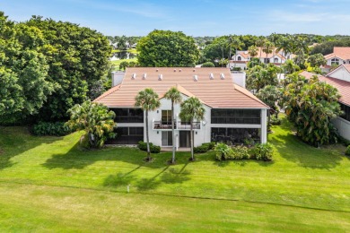Experience modern elegance in this 4-bedroom, 3-bath condo with on Broken Sound Golf and Club  in Florida - for sale on GolfHomes.com, golf home, golf lot