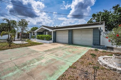 POOL HOME with a PRICE IMPROVEMENT! Bring OFFERS! This rare find on Forest Hills Golf Course in Florida - for sale on GolfHomes.com, golf home, golf lot