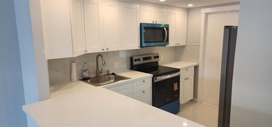 Spacious Remodel Balcony/Sunroom enclosed for additional living on Palm-Aire Country Club and Resort - The Oaks in Florida - for sale on GolfHomes.com, golf home, golf lot