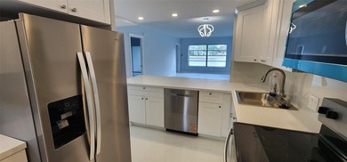 Spacious Remodel Balcony/Sunroom enclosed for additional living on Palm-Aire Country Club and Resort - The Oaks in Florida - for sale on GolfHomes.com, golf home, golf lot