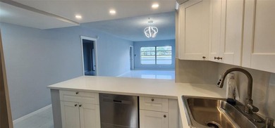 Spacious Remodel  Balcony/Sunroom enclosed for additional living on Palm-Aire Country Club and Resort - The Oaks in Florida - for sale on GolfHomes.com, golf home, golf lot