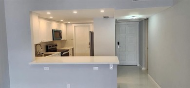 Spacious Remodel  Balcony/Sunroom enclosed for additional living on Palm-Aire Country Club and Resort - The Oaks in Florida - for sale on GolfHomes.com, golf home, golf lot