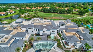 Experience modern elegance in this 4-bedroom, 3-bath condo with on Broken Sound Golf and Club  in Florida - for sale on GolfHomes.com, golf home, golf lot