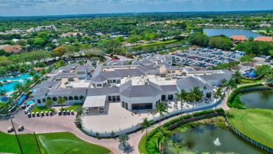 Experience modern elegance in this 4-bedroom, 3-bath condo with on Broken Sound Golf and Club  in Florida - for sale on GolfHomes.com, golf home, golf lot
