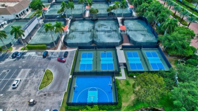 Experience modern elegance in this 4-bedroom, 3-bath condo with on Broken Sound Golf and Club  in Florida - for sale on GolfHomes.com, golf home, golf lot