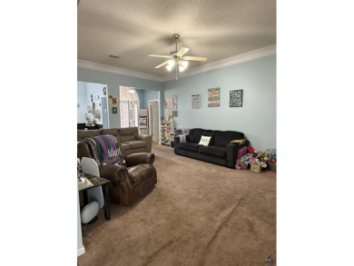 Welcome to this spacious 4-bedroom, 2-bath home in the highly on The International City Golf Course in Georgia - for sale on GolfHomes.com, golf home, golf lot