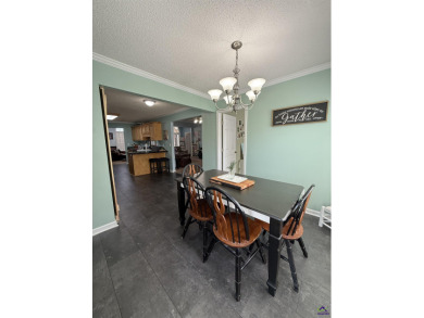 Welcome to this spacious 4-bedroom, 2-bath home in the highly on The International City Golf Course in Georgia - for sale on GolfHomes.com, golf home, golf lot