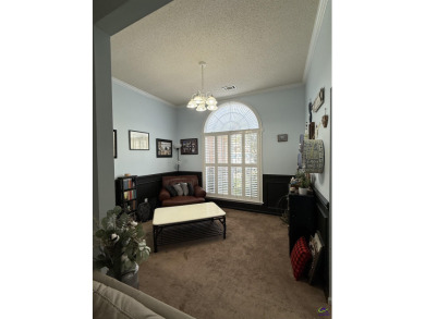 Welcome to this spacious 4-bedroom, 2-bath home in the highly on The International City Golf Course in Georgia - for sale on GolfHomes.com, golf home, golf lot