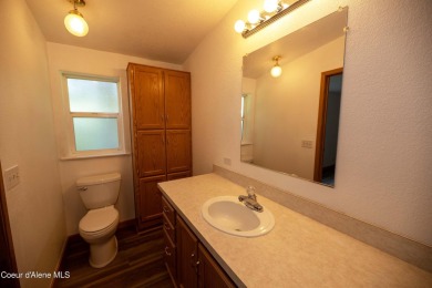Located on a quiet half-acre lot with 100 feet of Lamb Creek on Priest Lake Golf and Tennis Club in Idaho - for sale on GolfHomes.com, golf home, golf lot