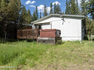 Located on a quiet half-acre lot with 100 feet of Lamb Creek on Priest Lake Golf and Tennis Club in Idaho - for sale on GolfHomes.com, golf home, golf lot