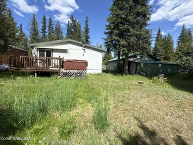 Located on a quiet half-acre lot with 100 feet of Lamb Creek on Priest Lake Golf and Tennis Club in Idaho - for sale on GolfHomes.com, golf home, golf lot