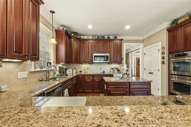 Lovely custom home located in the gated and golf community of on Carolina Trace Country Club in North Carolina - for sale on GolfHomes.com, golf home, golf lot