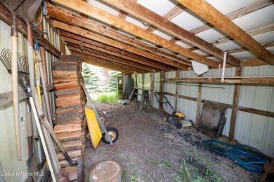 Located on a quiet half-acre lot with 100 feet of Lamb Creek on Priest Lake Golf and Tennis Club in Idaho - for sale on GolfHomes.com, golf home, golf lot