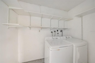 One or more photo(s) has been virtually staged. Discover this on Carrollwood Country Club in Florida - for sale on GolfHomes.com, golf home, golf lot