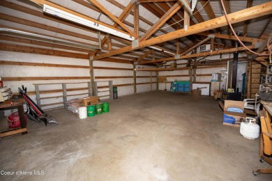 Located on a quiet half-acre lot with 100 feet of Lamb Creek on Priest Lake Golf and Tennis Club in Idaho - for sale on GolfHomes.com, golf home, golf lot