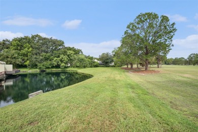 One or more photo(s) has been virtually staged. Discover this on Carrollwood Country Club in Florida - for sale on GolfHomes.com, golf home, golf lot