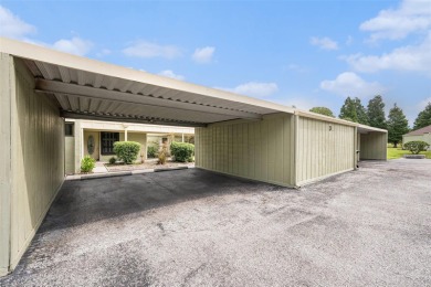 One or more photo(s) has been virtually staged. Discover this on Carrollwood Country Club in Florida - for sale on GolfHomes.com, golf home, golf lot