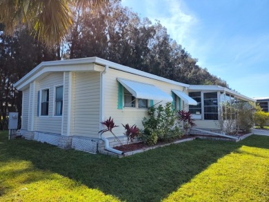 CHARMING COTTAGE HOME WITH PRIVATE BACK YARD! NEW VINYL PLANK on Vista Plantation Golf Club in Florida - for sale on GolfHomes.com, golf home, golf lot