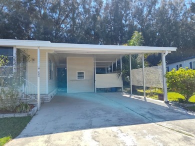 CHARMING COTTAGE HOME WITH PRIVATE BACK YARD! NEW VINYL PLANK on Vista Plantation Golf Club in Florida - for sale on GolfHomes.com, golf home, golf lot