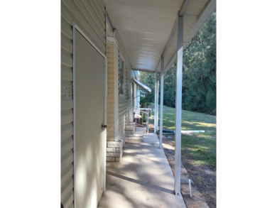 CHARMING COTTAGE HOME WITH PRIVATE BACK YARD! NEW VINYL PLANK on Vista Plantation Golf Club in Florida - for sale on GolfHomes.com, golf home, golf lot