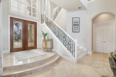 Welcome to this magnificent Villa Rosa Gem located on the 17th on Trump National Golf Club Jupiter in Florida - for sale on GolfHomes.com, golf home, golf lot