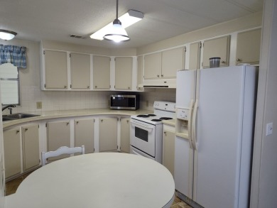 CHARMING COTTAGE HOME WITH PRIVATE BACK YARD! NEW VINYL PLANK on Vista Plantation Golf Club in Florida - for sale on GolfHomes.com, golf home, golf lot