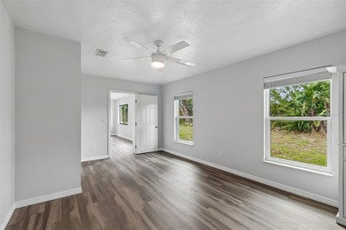Beautifully renovated 4-BEDROOM, 2-BATH home offering just over on Jacaranda West Country Club in Florida - for sale on GolfHomes.com, golf home, golf lot