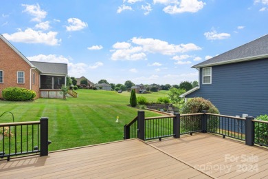 Nestled in a cozy spot just off the first green, but far enough on Fox Den Country Club in North Carolina - for sale on GolfHomes.com, golf home, golf lot