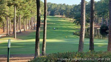 Exceptional .95-acre lakefront lot within the exclusive Pinewild on Pinewild Country Club of Pinehurst in North Carolina - for sale on GolfHomes.com, golf home, golf lot