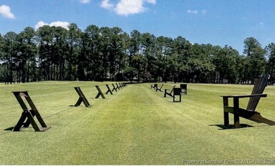 Exceptional .95-acre lakefront lot within the exclusive Pinewild on Pinewild Country Club of Pinehurst in North Carolina - for sale on GolfHomes.com, golf home, golf lot