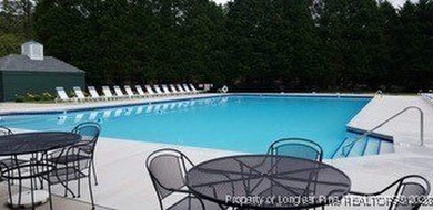 Exceptional .95-acre lakefront lot within the exclusive Pinewild on Pinewild Country Club of Pinehurst in North Carolina - for sale on GolfHomes.com, golf home, golf lot