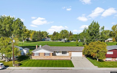 Custom built all-brick ranch home located on the Paradise Valley on Paradise Valley Country Club in Wyoming - for sale on GolfHomes.com, golf home, golf lot