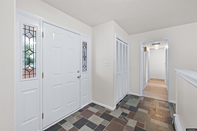 Custom built all-brick ranch home located on the Paradise Valley on Paradise Valley Country Club in Wyoming - for sale on GolfHomes.com, golf home, golf lot