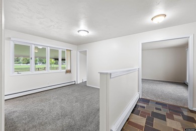 Custom built all-brick ranch home located on the Paradise Valley on Paradise Valley Country Club in Wyoming - for sale on GolfHomes.com, golf home, golf lot