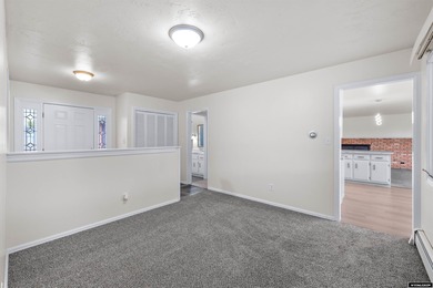 Custom built all-brick ranch home located on the Paradise Valley on Paradise Valley Country Club in Wyoming - for sale on GolfHomes.com, golf home, golf lot