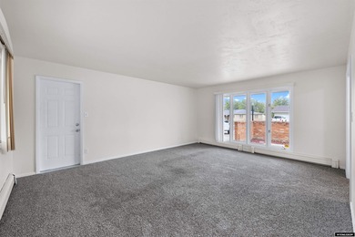 Custom built all-brick ranch home located on the Paradise Valley on Paradise Valley Country Club in Wyoming - for sale on GolfHomes.com, golf home, golf lot