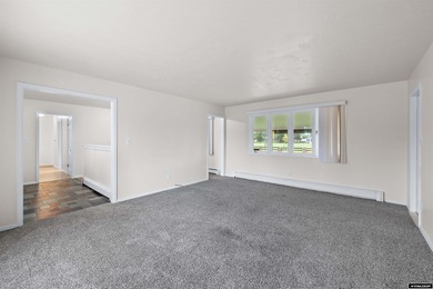 Custom built all-brick ranch home located on the Paradise Valley on Paradise Valley Country Club in Wyoming - for sale on GolfHomes.com, golf home, golf lot