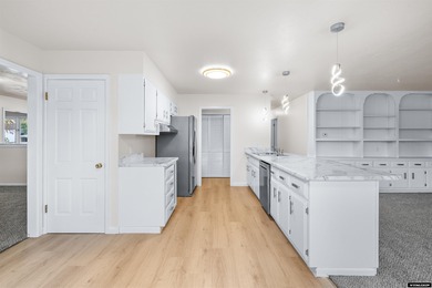 Custom built all-brick ranch home located on the Paradise Valley on Paradise Valley Country Club in Wyoming - for sale on GolfHomes.com, golf home, golf lot