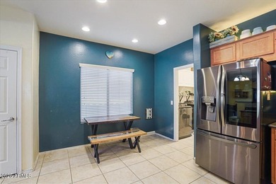 Built in 2007, this Florence single story home offers a mix of on Poston Butte Golf Club in Arizona - for sale on GolfHomes.com, golf home, golf lot