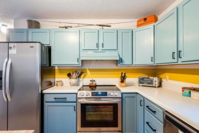 Cozy, contemporary, and full of charm--this mountain home in on Woodstone Meadows Golf Course At Massanutten in Virginia - for sale on GolfHomes.com, golf home, golf lot