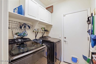 Built in 2007, this Florence single story home offers a mix of on Poston Butte Golf Club in Arizona - for sale on GolfHomes.com, golf home, golf lot