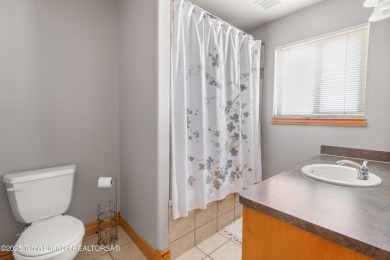 This very-well maintained home in Star Valley Ranch offers an on Star Valley RV Golf Course in Wyoming - for sale on GolfHomes.com, golf home, golf lot