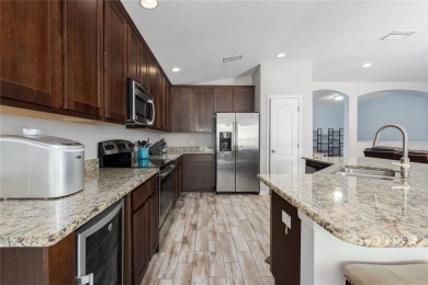 Just in time for the new school year! This spacious 4-bedroom on Imperial Lakewoods Golf Club in Florida - for sale on GolfHomes.com, golf home, golf lot